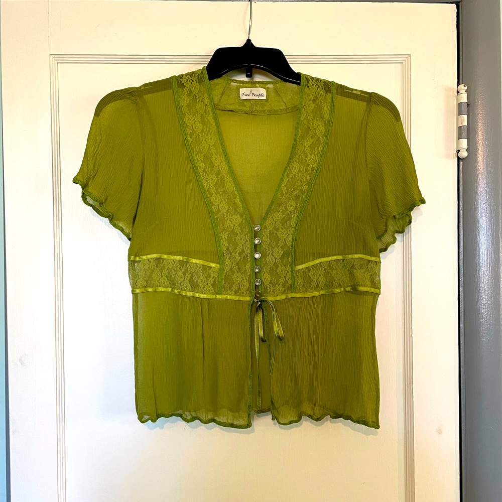 Sheer green Free Peoples women’s blouse.  Size small to medium.